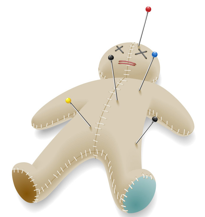 Voodoo doll with pins