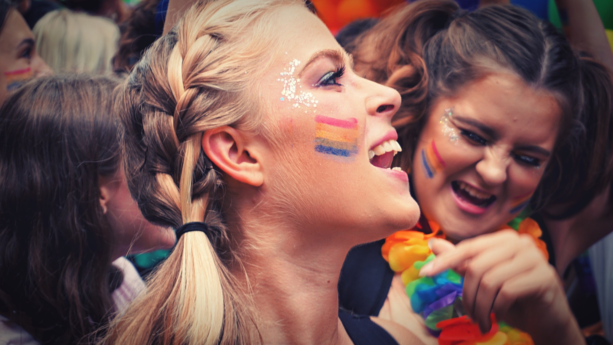 pride-parade-people-rainbow-flag-gay-support-equality-diversity-relationship-celebration-couple_t20_noOdP8 (1)