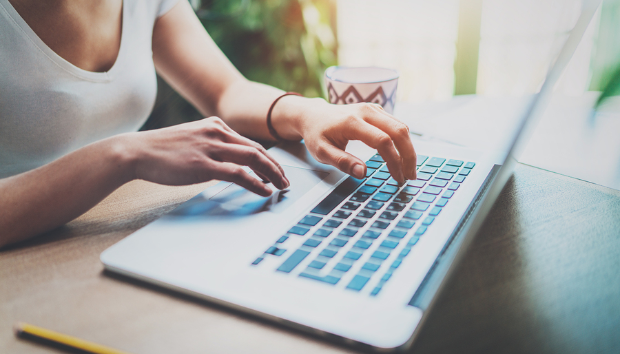 woman at computer typing