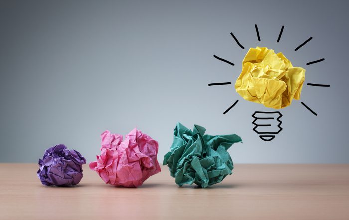 Inspiration concept crumpled paper light bulb metaphor for good idea