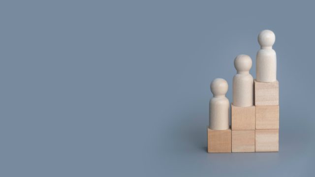 wooden-people-on-stairs-on-grey-background-with-copy-space-work-person-step-people-leadership_t20_pWadk8