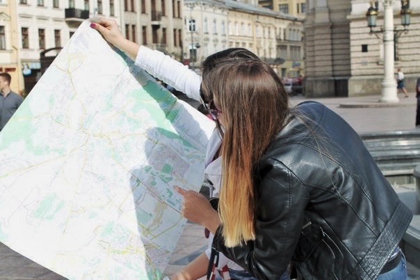 roadmap to nonprofit communications success - 2 people looking at a map