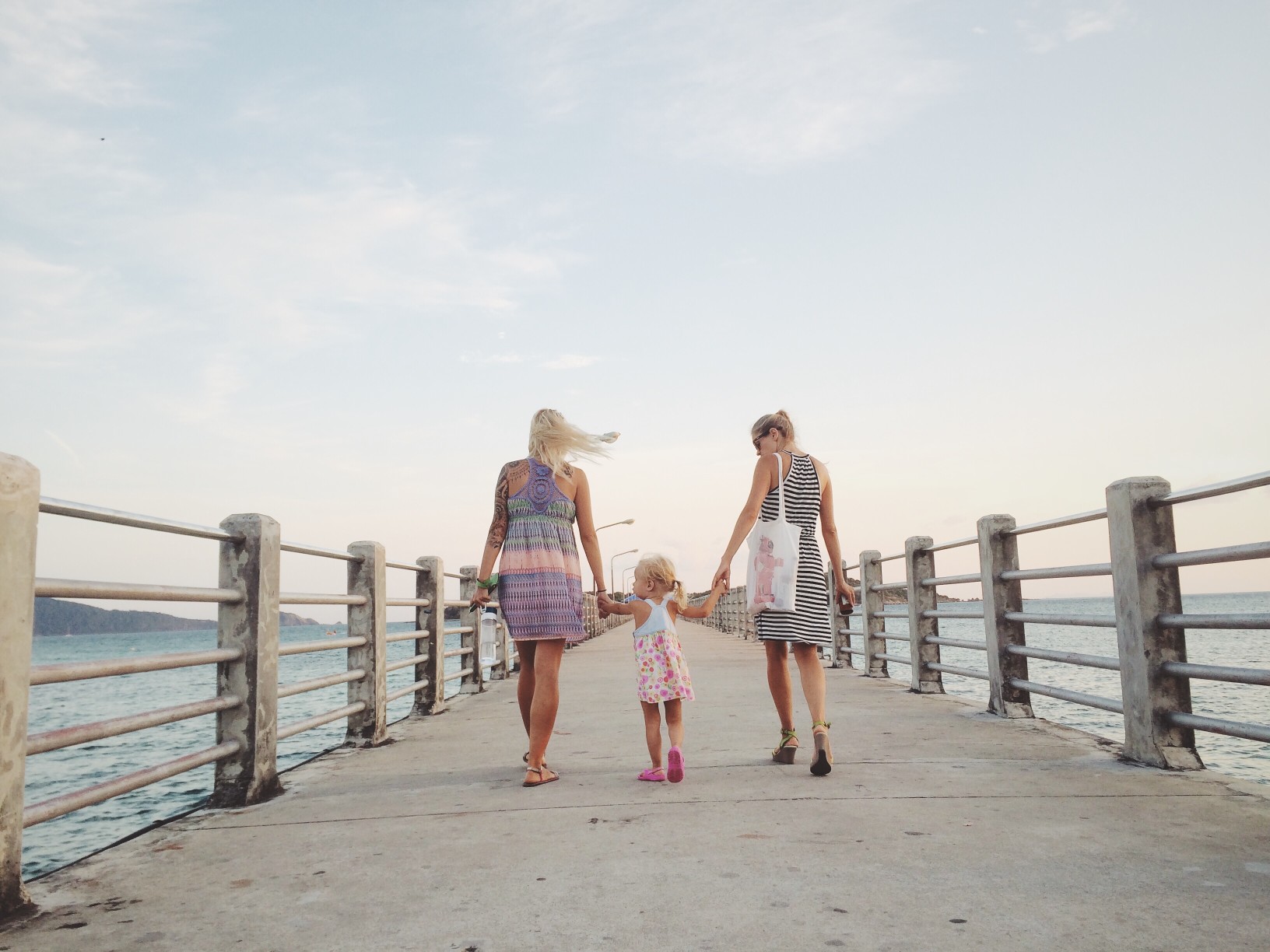 Family on a walk on a board walk